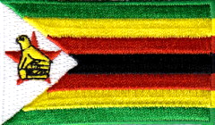 ZIMBABWE TYGMÄRKE 65x38mm