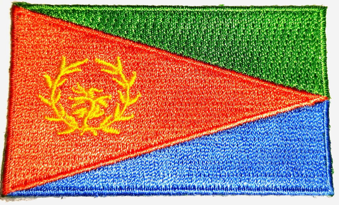 ERITREA TYGMÄRKE 65x38mm